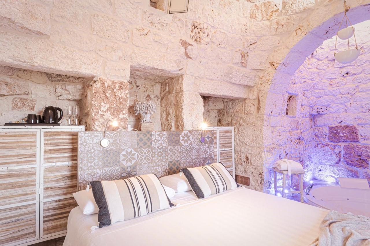 ホテル Relais Il Trullo Della Rupe オストゥーニ エクステリア 写真