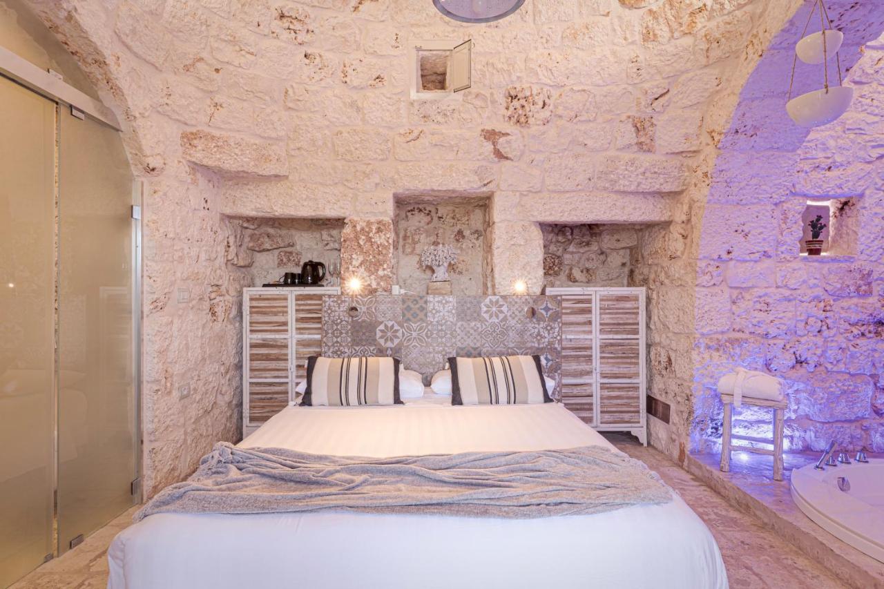ホテル Relais Il Trullo Della Rupe オストゥーニ エクステリア 写真